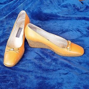 Bally Orange leather espadrilles approximately size 6 approximately 2 1/2"wedge